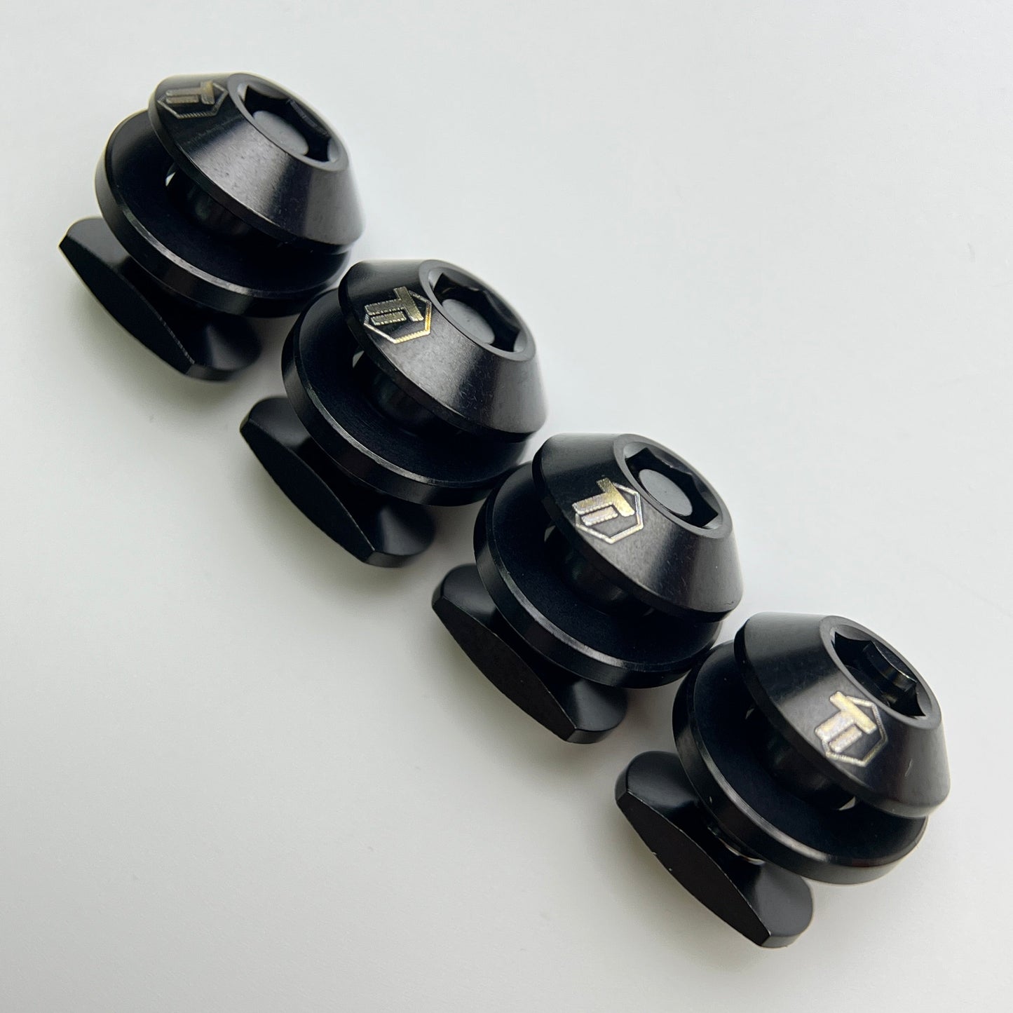 Set of four nitride black Brompton brake shoe bolts