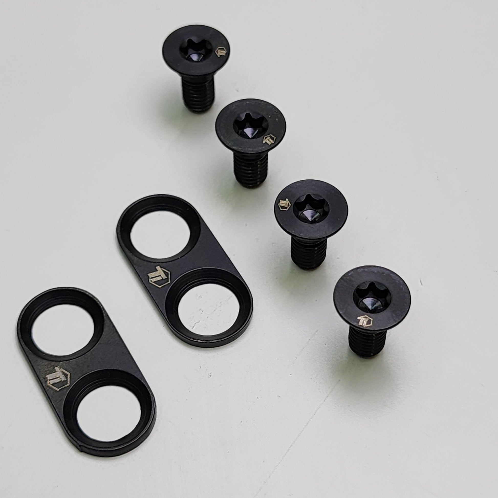 Black titanium cleat bolts and plates for Shimano SPD cleats