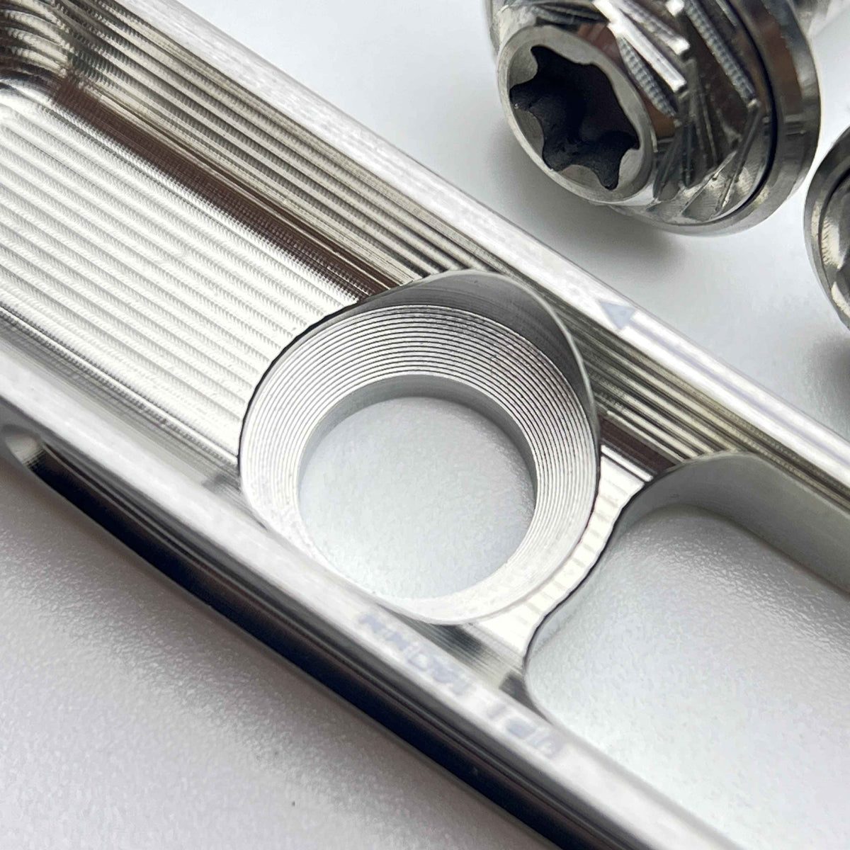 HotCheck x TiParts Titanium adapter čeljusti prednje kočnice | 60/70mm