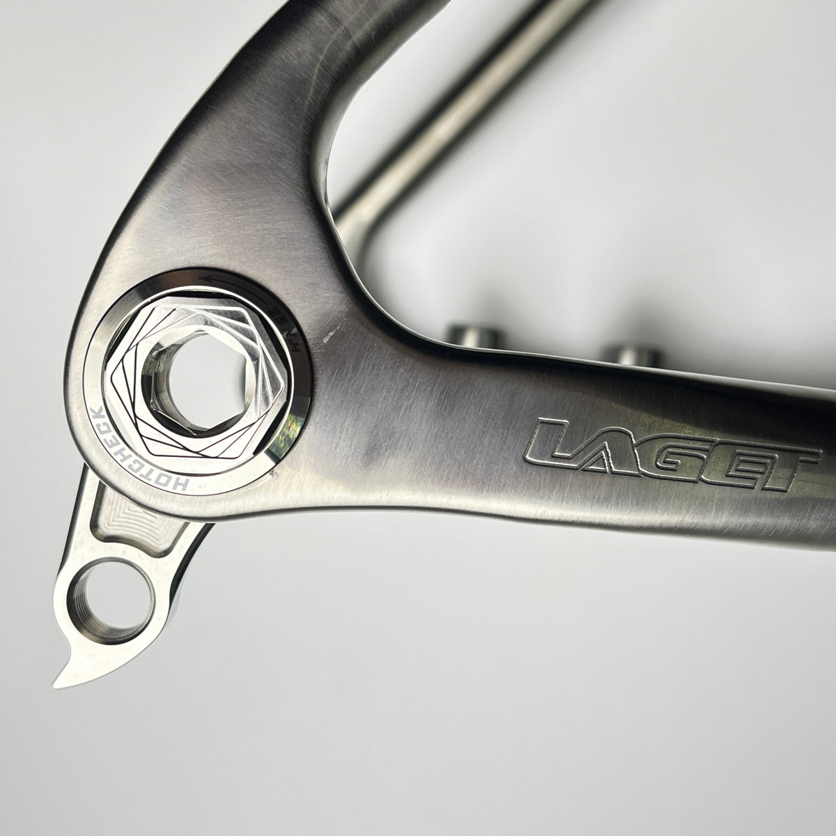 Hot Check x TiParts Titanium Universal Rear Derailleur Hanger (UDH RD Hanger) | Shimano & SRAM