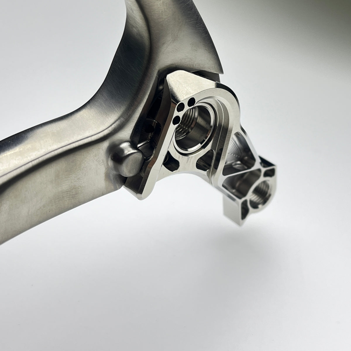 Hot Check x TiParts Titanium Universal Rear Derailleur Hanger (UDH RD Hanger) | Shimano & SRAM