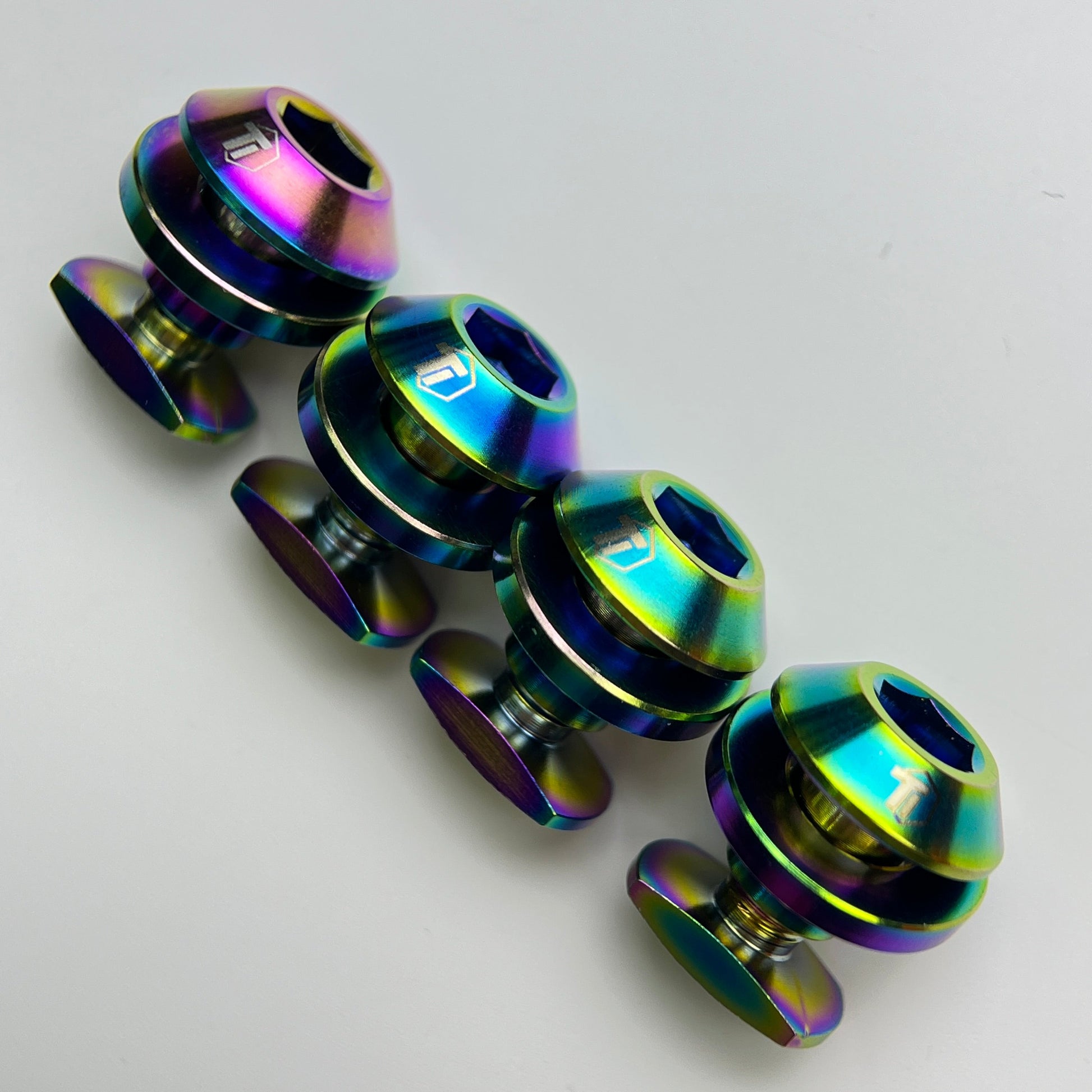 Set of four rainbow oil slick Brompton brake shoe bolts
