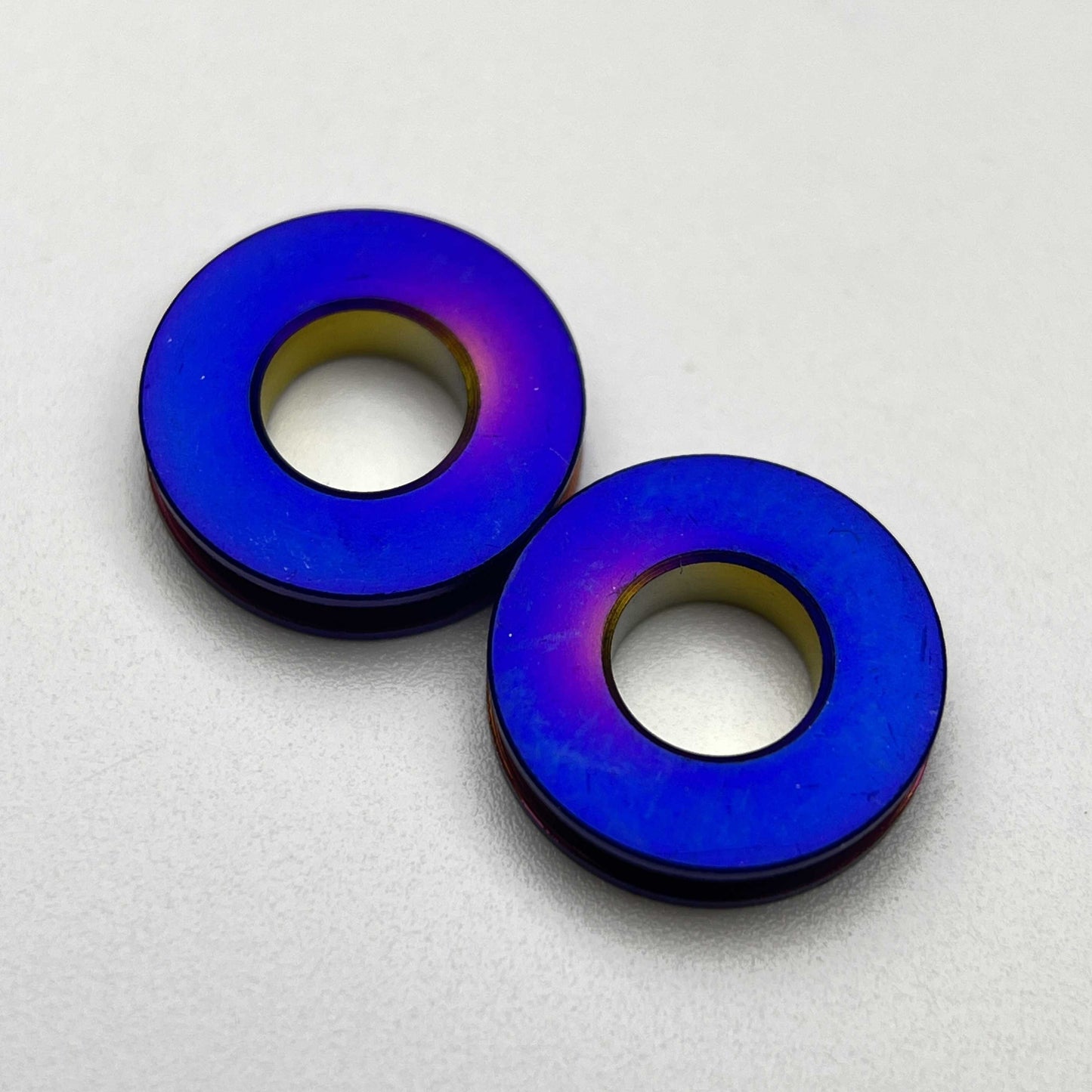 สเปเซอร์กรงขวดน้ำไททาเนียม | ป้องกันความเสียหายของสีเฟรม!