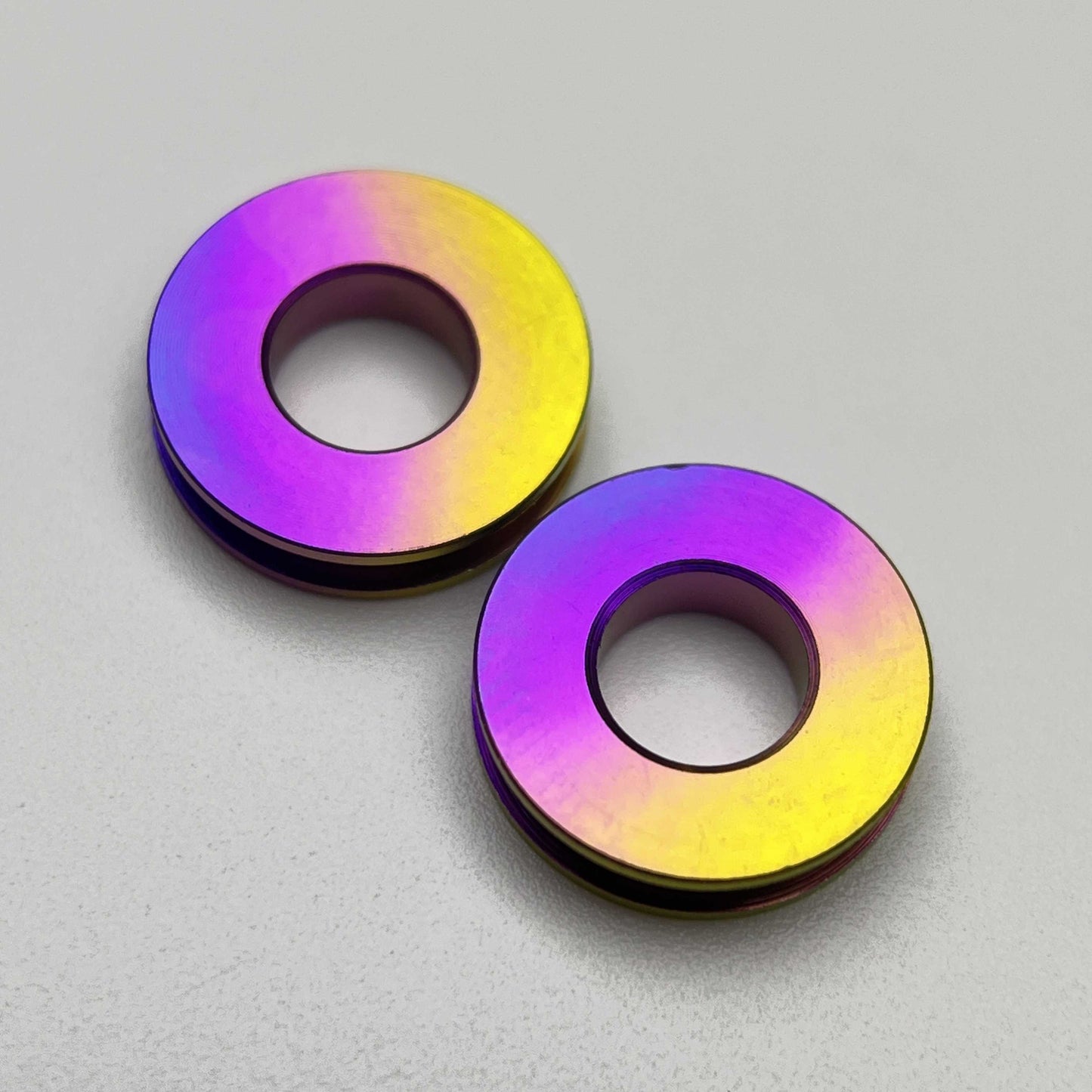 สเปเซอร์กรงขวดน้ำไททาเนียม | ป้องกันความเสียหายของสีเฟรม!