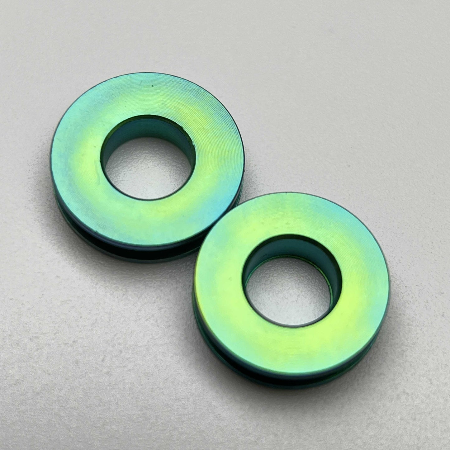 สเปเซอร์กรงขวดน้ำไททาเนียม | ป้องกันความเสียหายของสีเฟรม!