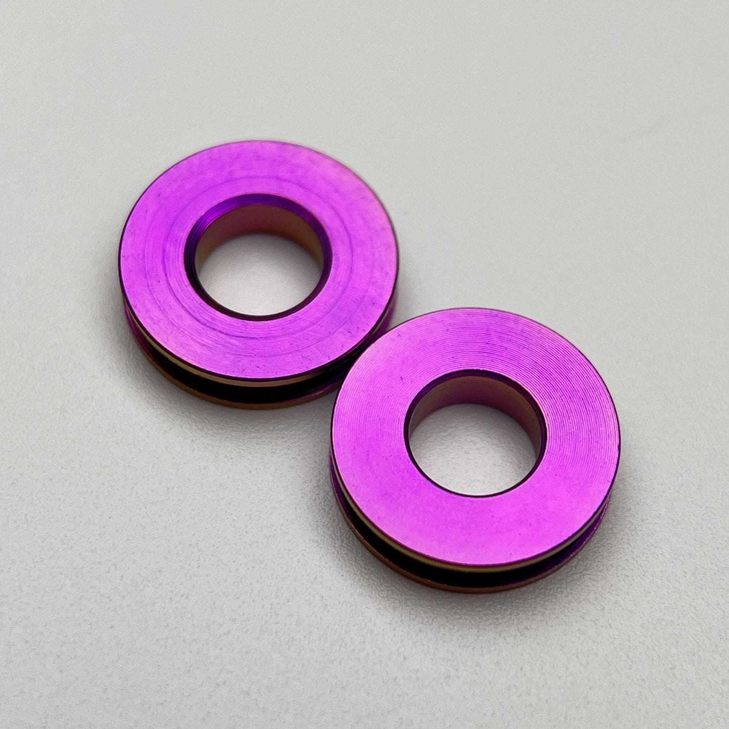 สเปเซอร์กรงขวดน้ำไททาเนียม | ป้องกันความเสียหายของสีเฟรม!