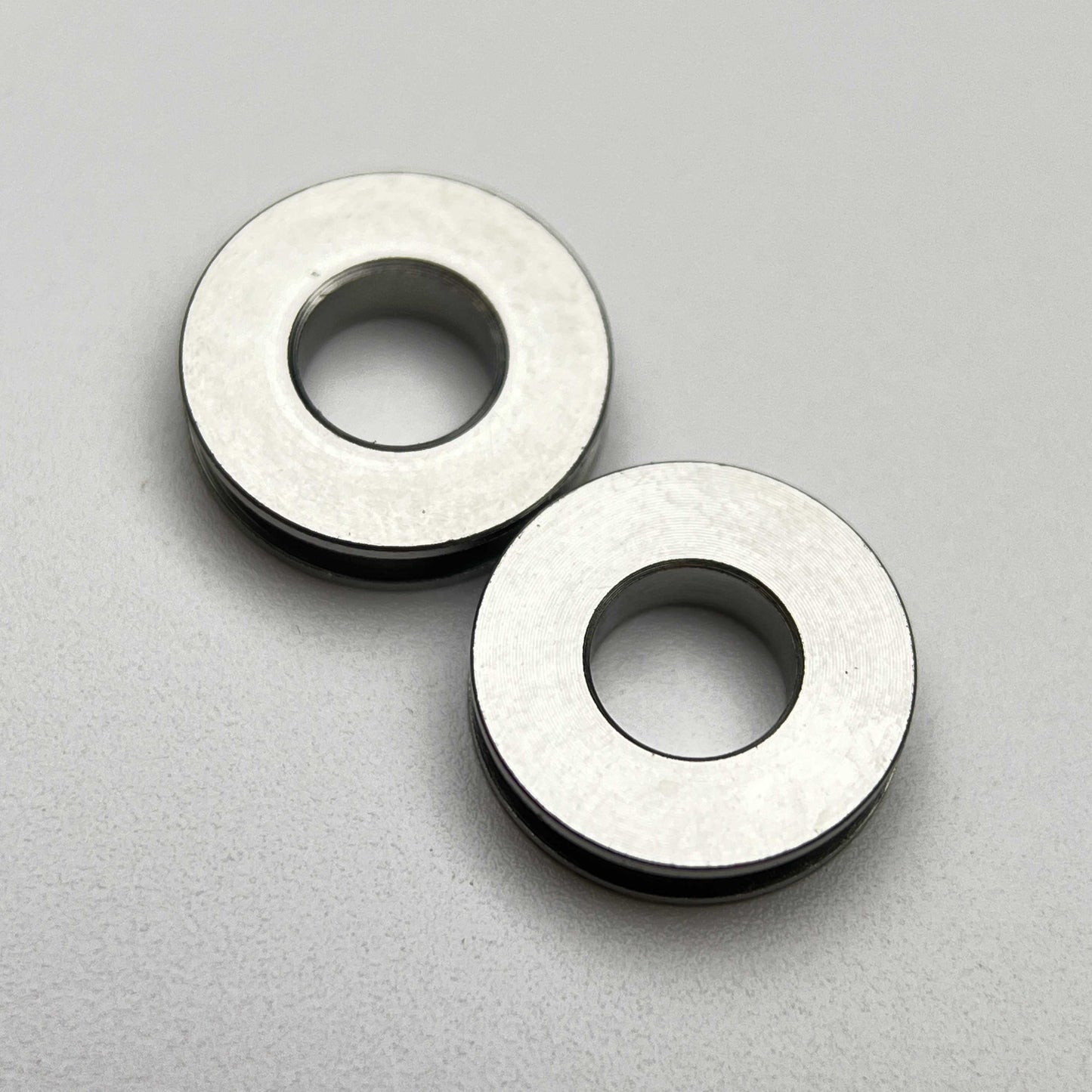 สเปเซอร์กรงขวดน้ำไททาเนียม | ป้องกันความเสียหายของสีเฟรม!