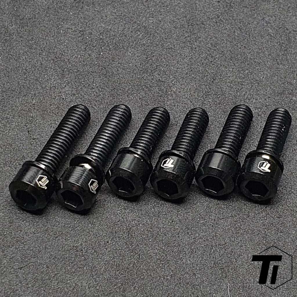 Nitride black titanium bolts for the Revgrips Pro stem viewed from the front