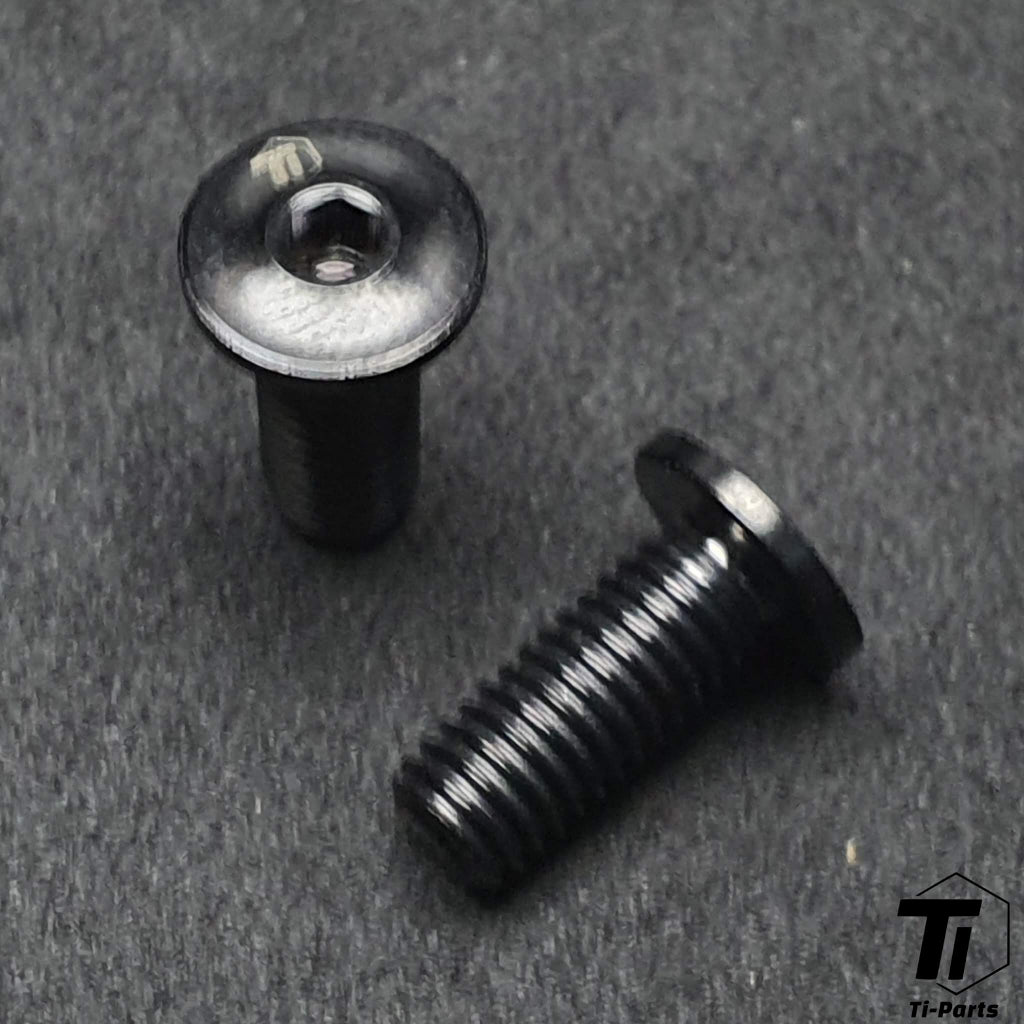 Nitride black M5 flat head titanium gravel top tube screws close-up